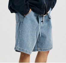 Load image into Gallery viewer, LYOCELL BELTED DENIM SHORTS - LIGHT BLUE
