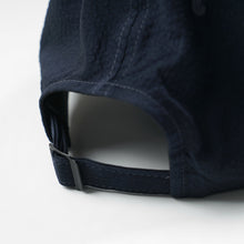 Load image into Gallery viewer, SEERSUCKER FEATHER CAP - NAVY
